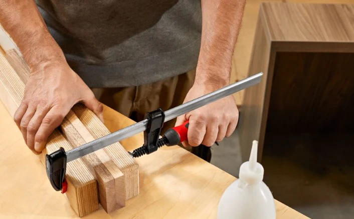 Bessey TG5.512+2K 12 in. x 5-1/2 in. 1320 lb. Clamping Force Medium Duty F-Style Woodworking Clamp with 2K Handle - Image 2